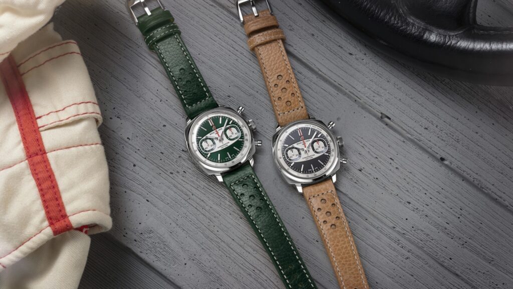 {generated} 緑とベージュのレザーストラップを備えたBreitling Top Time Racingが灰色の木上に並ぶ洗練されたモータースポーツ感