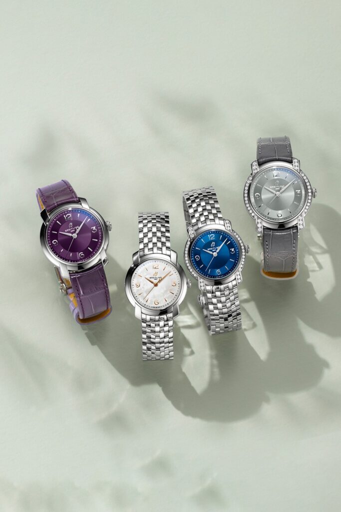 {generated} 紫、白、青、グレーの各文字盤が並ぶBreitling Lady Premierが新たなエレガントデザインを引き立てる構成