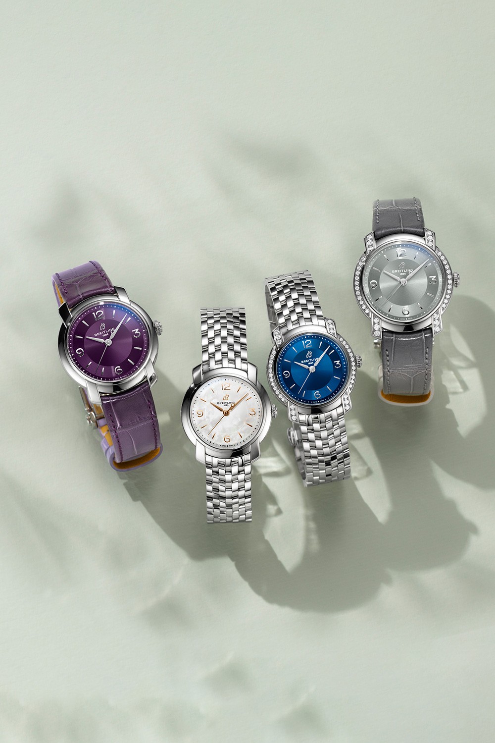 {generated} 紫、白、青、グレーの各文字盤が並ぶBreitling Lady Premierが新たなエレガントデザインを引き立てる構成